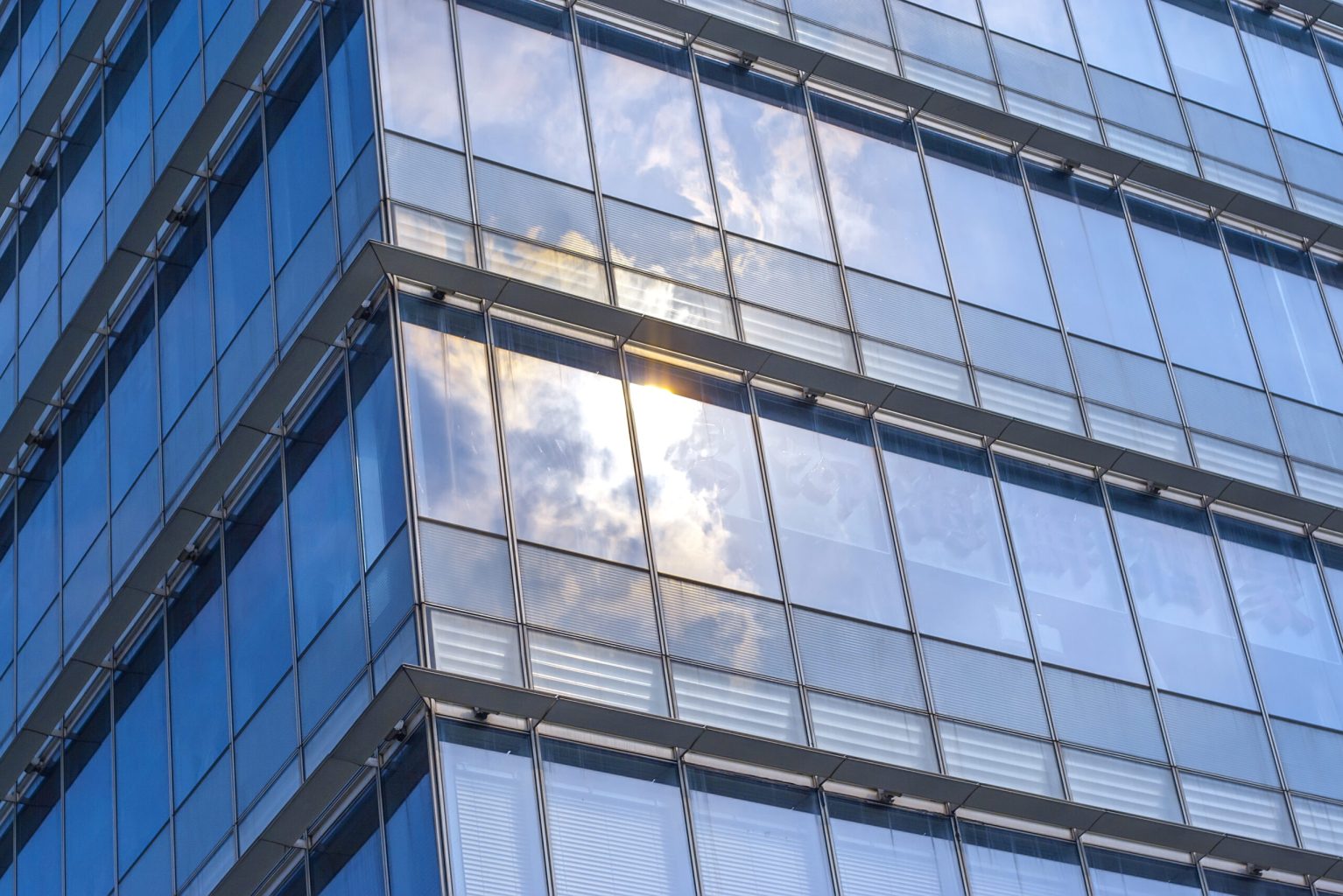 sunlight reflect on the glass wall
