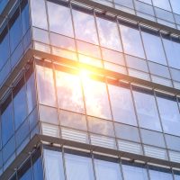 sunlight reflect on the glass wall